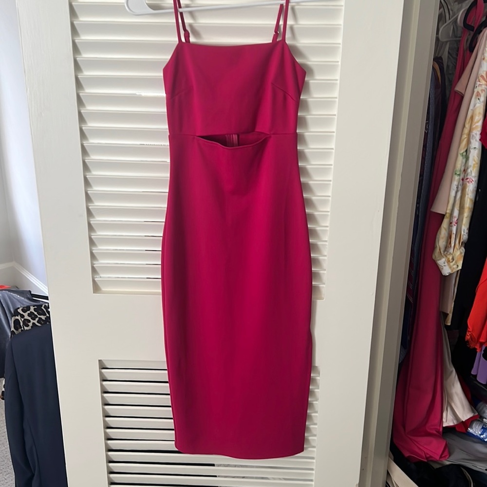 Hot pink midi dress. Key hole in the middle.